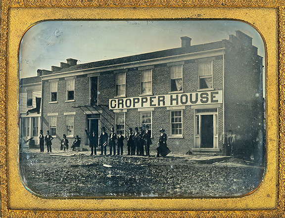 Half-plate daguerreotype of the Cropper House Hotel in Manchester, Ohio, sold for $4300 (est. $3000/5000). The catalog notes, &ldquo;The Cropper House was a two-story brick hotel operated by M.V. Cropper in Manchester, Adams County, Ohio. The image dates to the early 1850s, consistent with both the daguerreotype process and the hotel&rsquo;s listing in W.W. Reilly and Co.&rsquo;s Ohio State Business Directory for 1853-54, which places M.V. Cropper and the Cropper House in Locust Grove, Adams County. The 1858 brick building visible here was constructed by Cropper on the same foundation as an earlier frame structure that burned, and the hotel later passed through several proprietors before becoming the Manchester Hotel, which itself was destroyed by fire in January 1910.&rdquo; Michael Lehr Antiques, Rockaway, New Jersey, September 19.