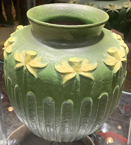 Robert Kaplan believes this vase with daffodils by the Grueby Faience Company of Boston is one of a kind. He said it was included in a 1901 ceramics exhibition in Manhattan and traveled elsewhere in the country. Grueby, known for its matte green glaze, spun off the faience firm to produce architectural terra cotta, glazed bricks, and other items. The company went bankrupt in 1908 but continued producing work until 1920. The price on the vase was $285,000.