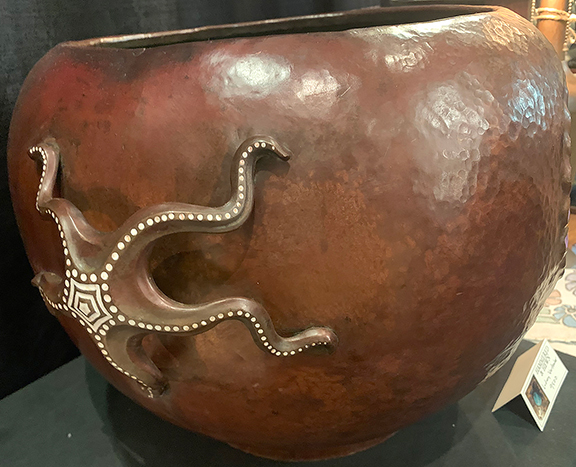 Inspired by illustrations of undersea life, this copper planter features enamel anemone and starfish. Designed by Ludwig Vierthaler (German, 1875-1967) of J. Winhart & Co., Munich, it dates to 1904 and came in three sizes. Bryan Mead of Hammered & Hewn, Pasadena, California, said it was found in a garage sale in Chicago and is one of only two known. It was priced at $9500.