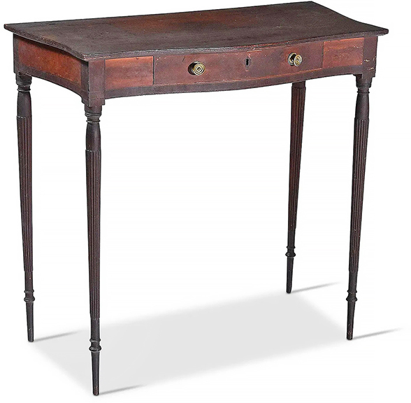 This New Hampshire mahogany dressing table, with a crazed, dark early surface, is attributed to Portsmouth, 1800-10. The delicate table with serpentine top and extremely thin reeded legs sold on Brunk Live for $15,000 ($5000/7000). It had sold at Eldred&rsquo;s on March 30, 2001, for $72,900, and Wayne Pratt had the 33&frac14;