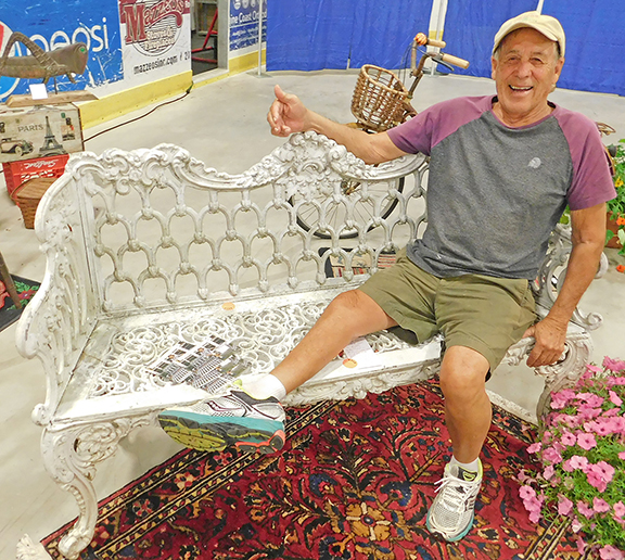 Joni Lima and Joe Spaider of Round Pond, Maine, are both on the rebound from serious bouts with illness. &ldquo;It&rsquo;s all behind us now,&rdquo; Joni said. &ldquo;We haven&rsquo;t done a show in a whole year.&rdquo; But now they&rsquo;re back, with Joni relaxing on a white painted cast-iron garden bench by Molla in Georgian style, dating from the mid- 20th century. The asking price was $2800, and it was already sold when I took the shot.