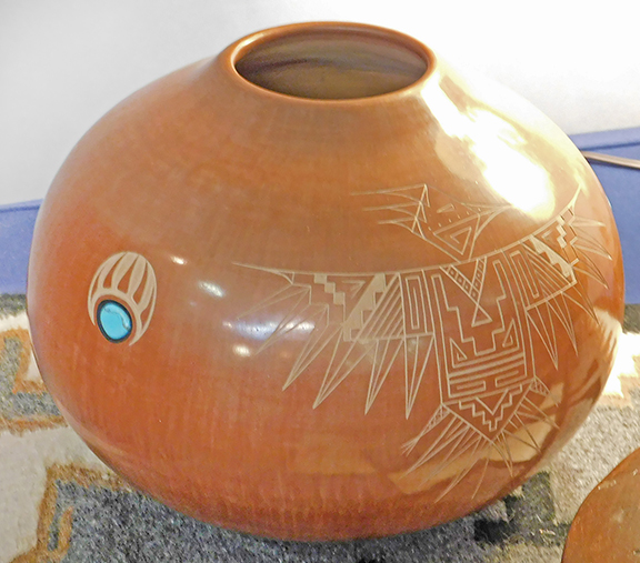 Greg Hamilton of Stone Block Antiques, Vergennes, Vermont, had a booth accented by both Mexican and Native American pottery. &ldquo;I have two collections that I just bought recently,&rdquo; he noted. This highly polished olla with inlaid turquoise and a sgraffito eagle, signed illegibly on the bottom,was $1100.
