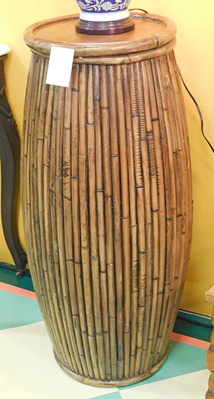 Robert Foley of Gray, Maine, had a pair (one shown) of tall mid-20th-century bamboo lamp stands or end tables. Dramatic and exotic, they awaited $1350 for the pair
