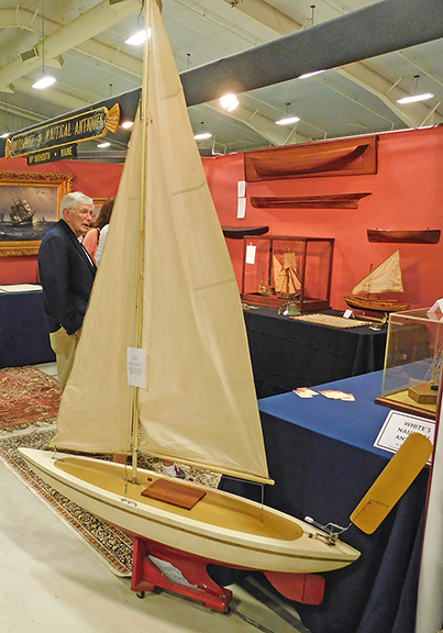 Frequently I include a measuring object as a size indicator in photographs. In this case, Dave White himself, of White&rsquo;s Nautical Antiques, North Yarmouth, Maine, served the function quite well. This $1650 pond model, made by William Wadsworth of Camden, Maine, stands about seven feet tall. Wadsworth built about seven of them, and this is the only one built as a double ender with a vane steering gear.