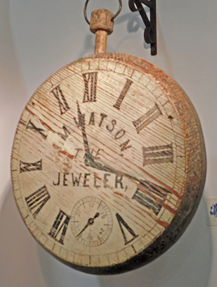 Joe Genereux of MG Art and Antiques, Merrimac, Massachusetts, offered this two-sided 19th-century jeweler&rsquo;s trade sign in the form of a wooden pocket watch, for $1095.