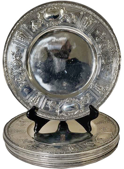 Done in the Maintenon pattern, this set of eight Gorham sterling silver dinner plates with a total weight of 198 troy ounces sold for $13,200 (est. $3000/6000).