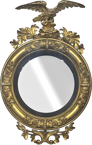 Having an eagle crest, this circa 1815 convex mirror, wearing its original gilding, sold for $1920 (est. $500/1500). It measures 35