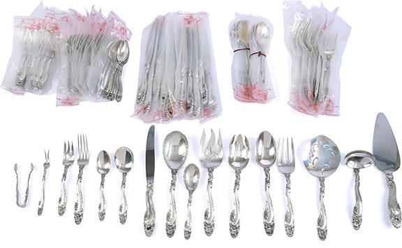 Among the leading lots was an uncased set of Gorham sterling silver flatware, totaling about 80 pieces and weighing about 3807 grams or 122.4 troy ounces. Even though as of this writing, the current silver price is down to about half of its January peak, the buyer, at $4290 with a $5000/7000 estimate, should have enough leeway to hold it or sell it profitably.
