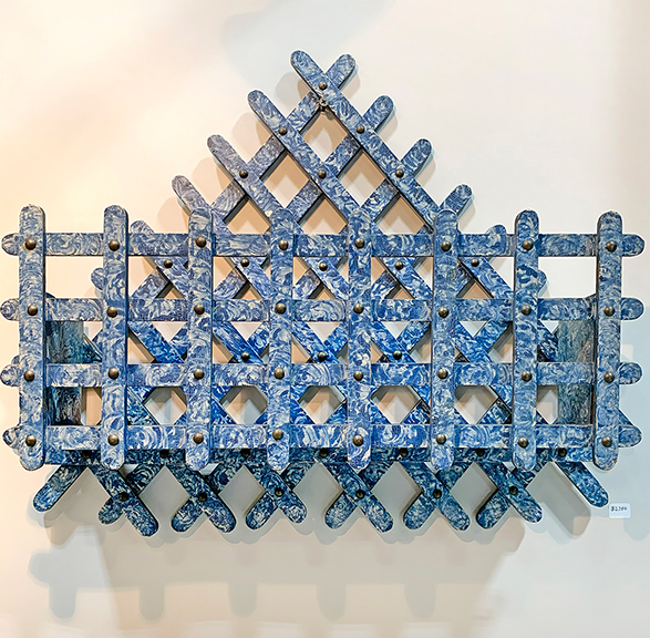 Edgerton also had a Victorian lattice work letter holder, circa 1900, in the original marbleized blue and white paint, lapped together with brass tacks. It was tagged $2750. A miniature feather basket, 4&frac12;