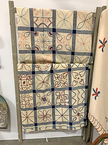 Bob Jessen and Jim Hohnwald of Fitzwilliam, New Hampshire, had a nearly full booth for much of early buying. They showed a linsey-woolsey coverlet, 90