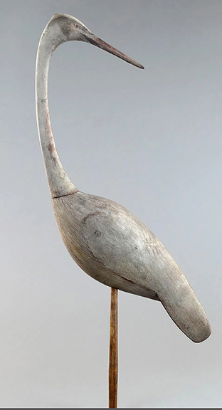 The hollow preening great blue heron, circa 2010, by Mark S. McNair (b. 1950) of Craddockville, Virginia, earned a world record auction price of $38,400 (est. $5000/8000). The 57¼