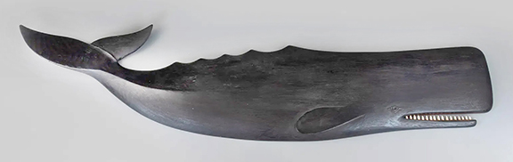 This Mark S. McNair carved sperm whale, 50¾