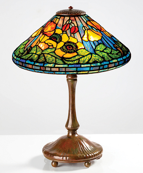 Tiffany Studios Poppy table lamp, circa 1910, leaded glass and patinated bronze, shade and base both impressed “Tiffany Studios New York,” 23
