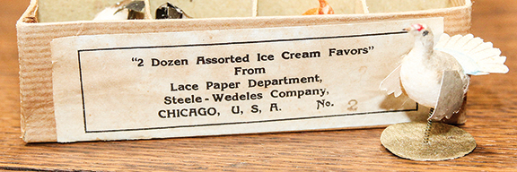 Ice cream favors in the form of birds on springs, 22 (two missing) in the original box, by the Steele-Wedeles Co. of Chicago, each bird about 13/8