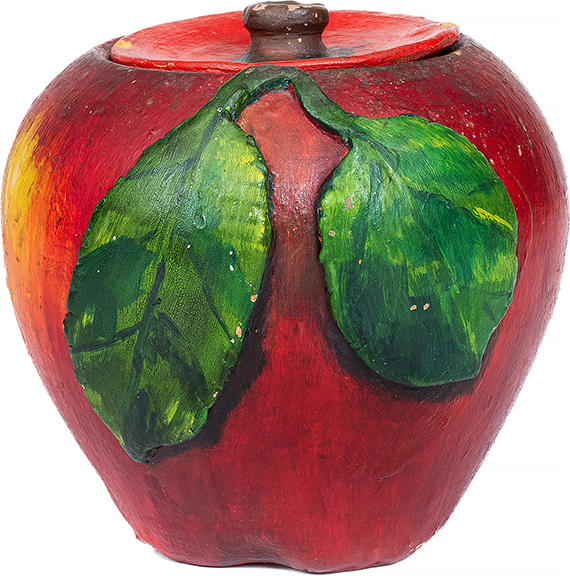 A rare item, this circa 1928 glazed and cold-painted redware apple-form jar with a lid, 5½