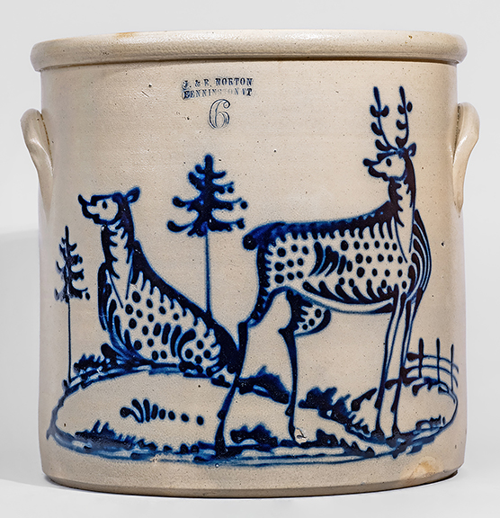 The six-gallon stoneware crock with a cobalt stag and doe scene, stamped “J. & E. NORTON / BENNINGTON VT,” circa 1855, sold for $72,000 (est. $30,000/50,000). The 13¾