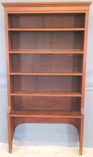 Early New England open bookcase in old red paint