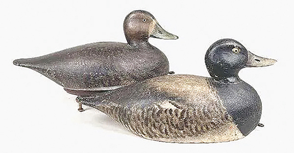 Made around 1900 for Lombard C. Jones, M.D. (1865-1944), of Sandwich, Massachusetts, by A. Elmer Crowell before he began stamping his birds, this early pair of bluebill decoys is rare. Both birds exhibit very light gunning, both are signed “Dr. L.C. Jones” on the bottom, and both bear the collector’s label “TMH.” The pair realized $7687.50 (est. $9000/11,000). Jones owned a rig of Crowell’s redheads and bluebills. The birds were on view in spring 2022 at the Sandwich Glass Museum in An Intimate View: Sandwich Through a Lens, an exhibit on several generations of the Jones family.