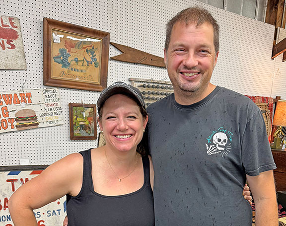 Dealers Matt Grieg and Emily Brandenburg tied the knot on June 6. Emily&rsquo;s hat reads &ldquo;Sorry about my husband.&rdquo; The newly hitched couple from Milton, Delaware, offered several balloon molds from the early 20th century tagged $200 each.