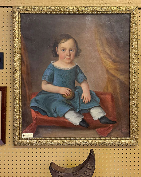 This early portrait of a child with a ball was $2500 from Gurley Antiques, Scarborough, Maine.