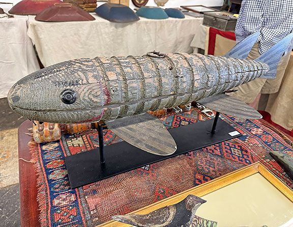 This sturgeon ice fishing decoy trade sign with a ribbed body, marked &ldquo;Cund,&rdquo; early 20th century, was $2850 from Firehouse Antiques, located at Buckley Mills in Rising Sun, Maryland. Owner Paul Thien said, &ldquo;We were not affected by the rain. Sales were decent but many fabulous items were passed on due to pricing&mdash;perhaps a sign of the times&hellip;. Overall, the Gurleys do a great job.&rdquo;