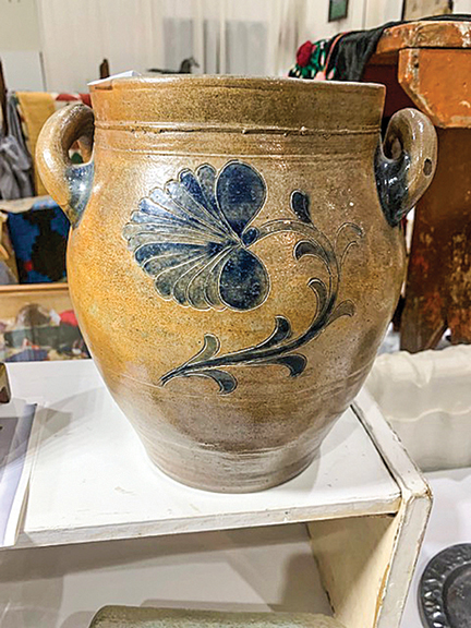 This early New York City stoneware crock with open handles and incised floral work was tagged $3950 by Art and Alice Booth of Wayne, New Jersey.