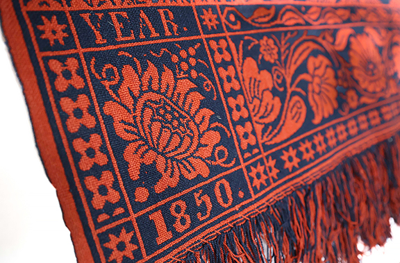 A detail from one of the jacquard coverlets on exhibit at the Indiana State Museum.