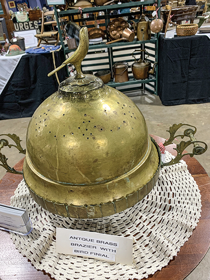 Antique brass brazier with a bird finial, $300 from All-A-Board, Palmyra, New York.