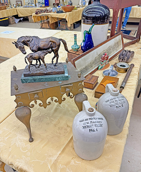 The brass footman was $375, and the jugs, each marked “Keep Jug Tightly Corked / Wm. Radam’s / “Microbe Killer,” were also individually marked “No. 1” and “No. 2.” The pair was priced at $355, and the signed horse and foal sculpture by French sculptor Christophe Fratin (1801-1864) was tagged $5000; all from Christine Nelson of Hollis, New Hampshire. According to the Smithsonian’s National Museum of American History, German gardener and botanist William Radam (1845-1902) immigrated to the United States around 1882, settling in Austin, Texas. He claimed his “Microbe Killer” would cure all diseases. It was a success—until passage of the Federal Food & Drugs Act of 1912. The numbers on each jug referred to the strength of the medicine.