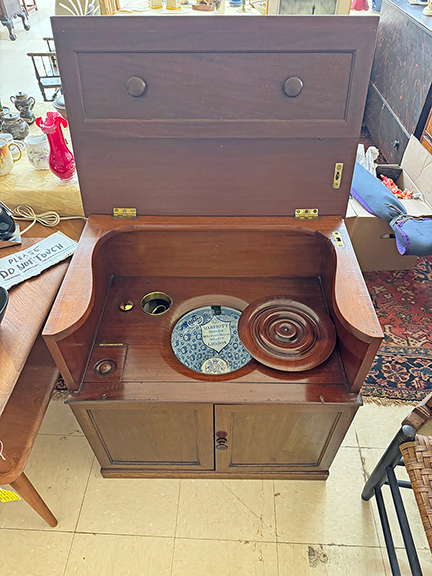 This English commode dates from the second half of the 19th century. The commode comes with a blue-and-white porcelain bowl marked “Marriott’s Portable Water Closets” and a grain-painted bucket (not shown). It was $1000 from Timothy Zalenski of Peterborough, New York.
