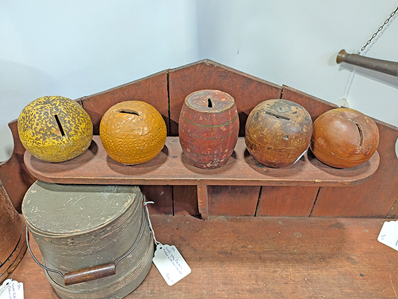 Comet Lake Antiques, Clinton, Ohio, a Hudson Antique Show staple, offered this grouping of chalkware banks. “I hope the same person buys them all,” dealer Mike Christy stated. “I think they are great together.” Each was priced at $125.