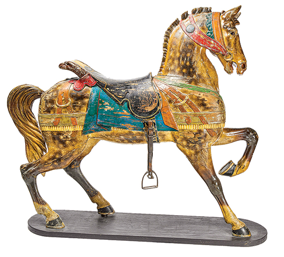 An outside row stander carousel horse with an eagle-form cantle, circa 1880, by German/American maker Gustav Dentzel (1846-1909) of Philadelphia brought $11,250 (est. $8000/15,000).