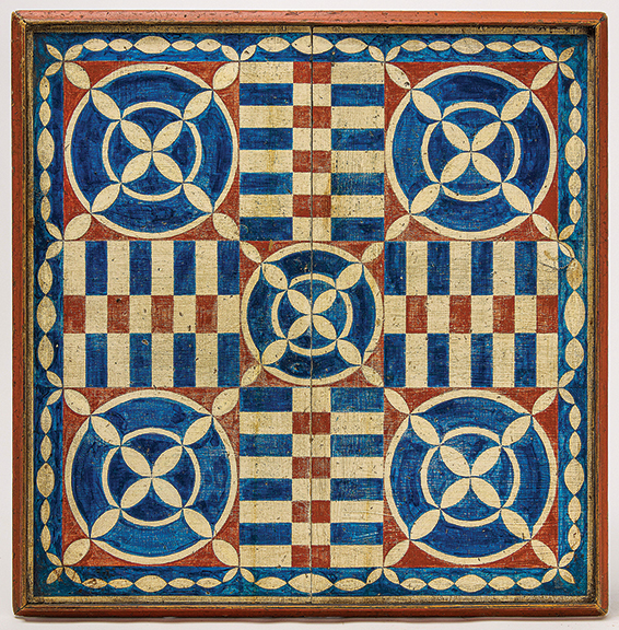 The 19th-century Parcheesi game board in original paint in an inventive design is painted on both sides, although the secondary side, not shown, may have had overpaint. Estimated at $1500/2500, the 23¾