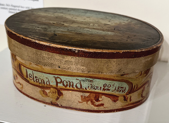 The fingered box from Hingham, Massachusetts, with later 19th-century painted decoration, “Island Pond [Vermont], June 22d, 1870,” was $6500 from Jeff and Holly Noordsy Antiques, Cornwall, Vermont.