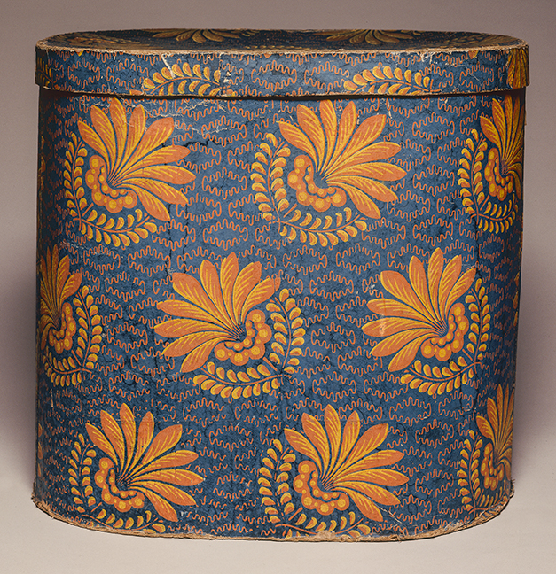 An Exceptional Pennsylvania Wallpaper Box  An extraordinary size box covered in a vibrant all-over block-printed wallpaper in shades of yellow and Indian Red on a dark blue field. “The Christian Advocate and Journal” and “The Zion Herald” newspapers were used to line this box and are dated “Friday February 14, 1832” and “Friday April 6,1832.” 17 ½ in. high, 18 in. wide, 14 in. deep.
