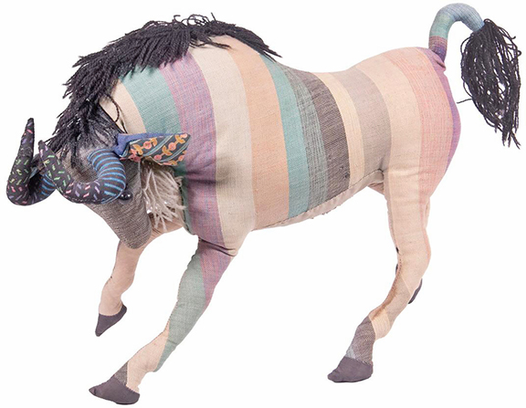 This Dahlov Ipcar (1917-2017) opus, a soft stuffed fabric wildebeest, in a pastel rainbow of stripes, with Ipcar&rsquo;s name stitched into the belly, came on strong. It leaped past the $1000/1500 estimate and ended at $9000.