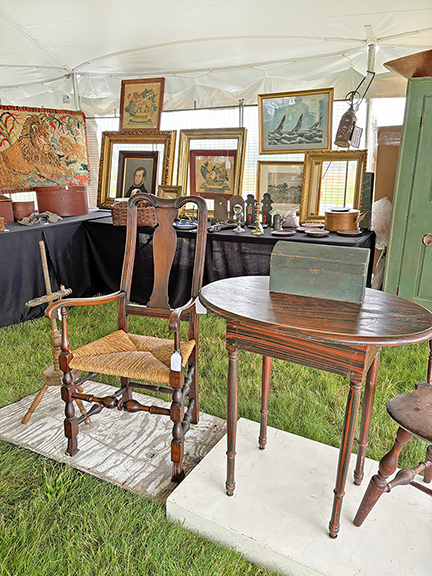 Derik Pulito of Kensington, Connecticut, had these early chairs, a tavern table, and a selection of early ironware.