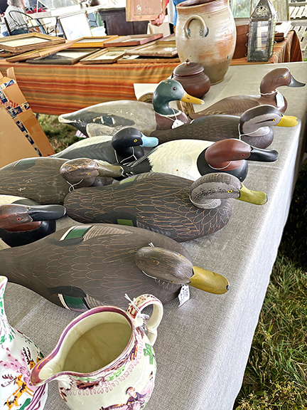 David Weiss of David M. Weiss Antiques, Sheffield, Massachusetts, had several decoys and stoneware. Many of the decoys were made by Madison Mitchell (1901-1993), who worked in the Chesapeake Bay region. Mitchell combined decoy making with his profession as a funeral director.