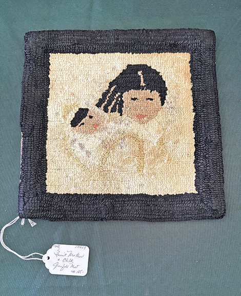 Michelle Genereux of MG Art and Antiques, East Kingston, New Hampshire, had an unusually small Grenfell mat depicting an Inuit mother and child. It was priced at $185.